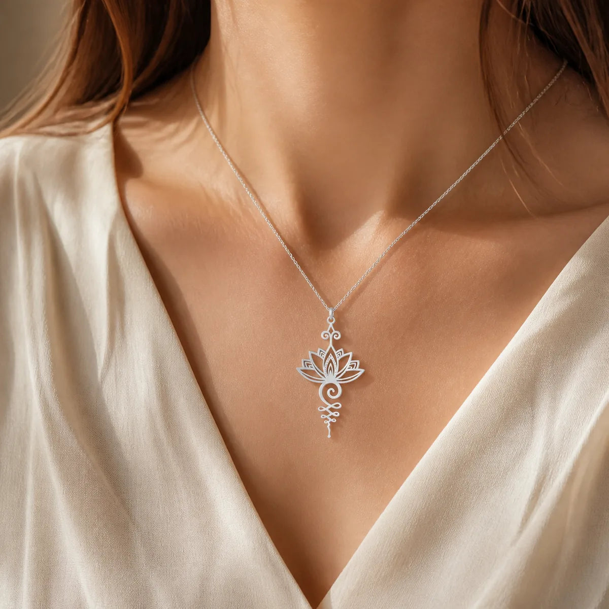 Lotus luck wealth necklace pendant worn by a woman